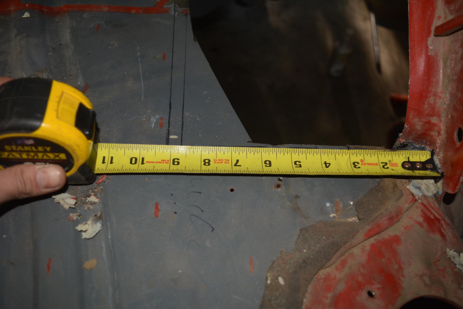 Double checking my 9 inch cut line with all the seam sealer removed