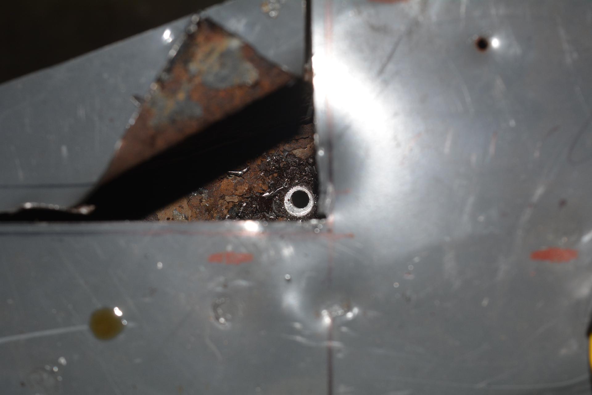 Drilled a hole as strait down as I could to figure out the bottom frame cuts