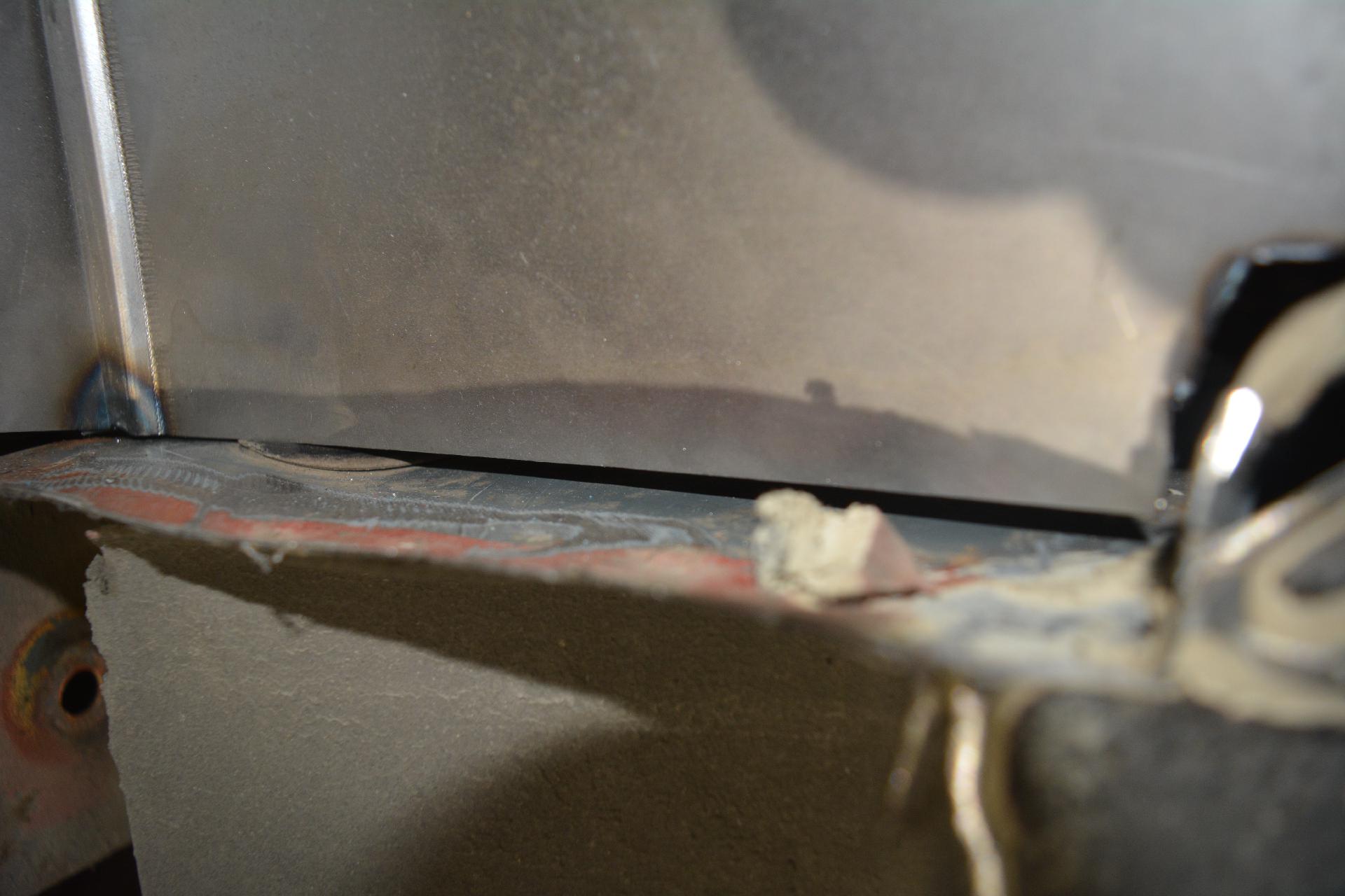 Tub sits over the lower torque box