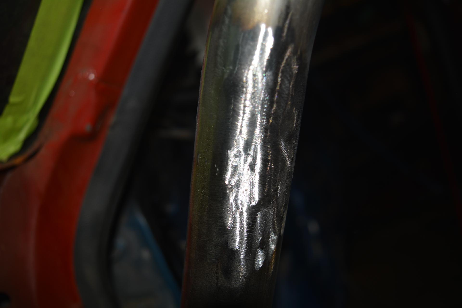 Damage re-welded and ground down